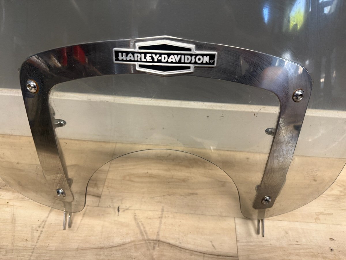 2005 Harley Davidson Fatboy Windshield and bracket with Logo Light Scratches - ApplianceSolutionsHub