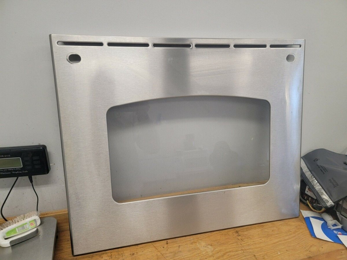 GE Range Outer Door Glass Stainless Light scratching WB56T10185 - ApplianceSolutionsHub